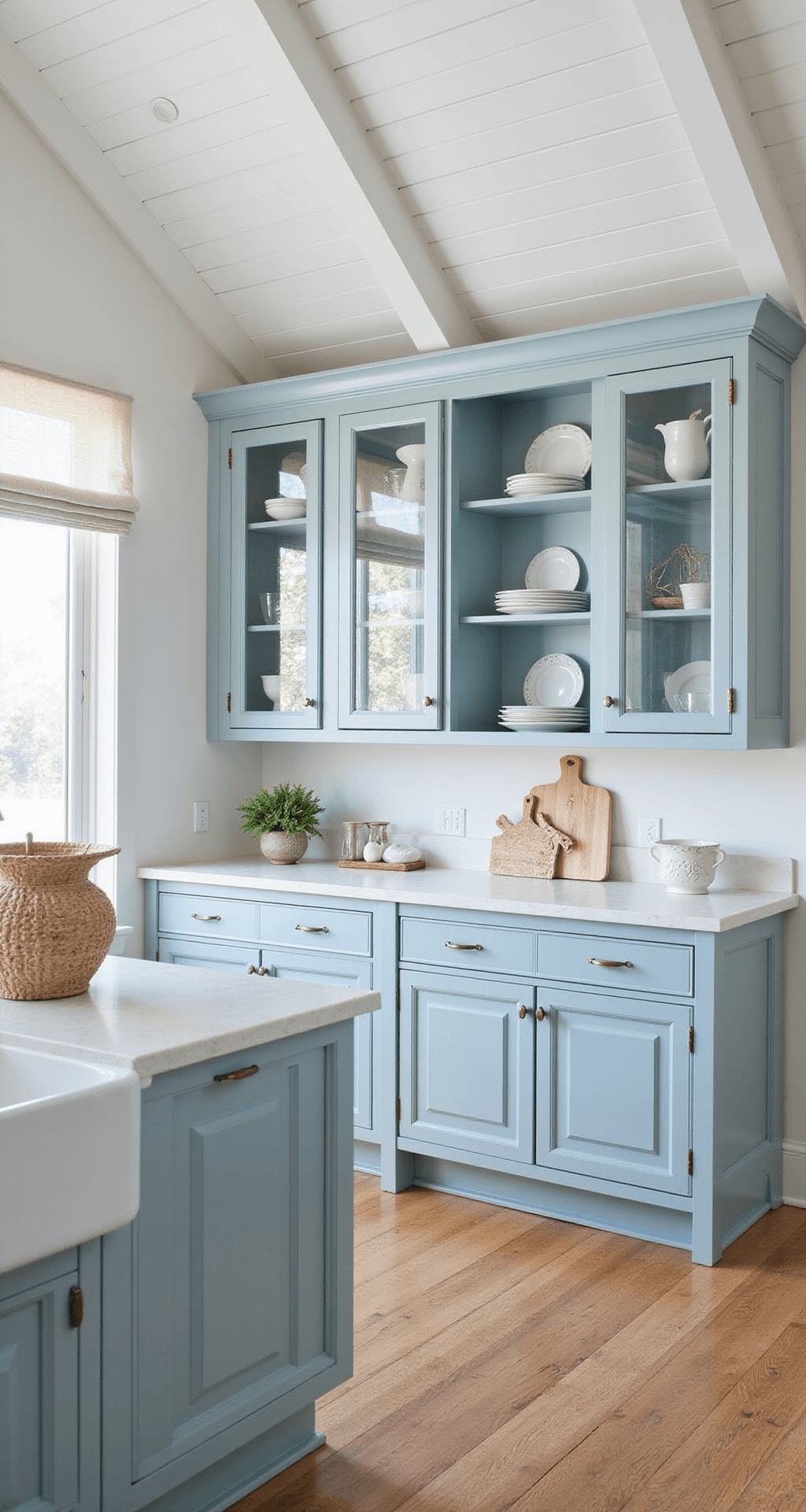Glass Kitchen Cabinets: Your Ultimate Style & Functionality Guide A sunlit coastal kitchen featuring pale blue cabinets with seeded glass doors, displaying white ironstone and sea glass, under a vaulted white-planked ceiling, with a beachy color palette of soft blues, whites, and sandy beige.