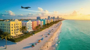Miami Beach in February: Your Ultimate Sun-Soaked Winter Escape Guide "Aerial view of Miami Beach coastline with Art Deco buildings, swaying palm trees, beachgoers, and city skyline at golden hour in February"