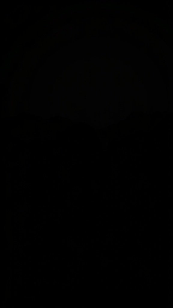 50 Stunning Black Wallpapers for a Chic Look Silhouetted mountains against a dark sky at dusk